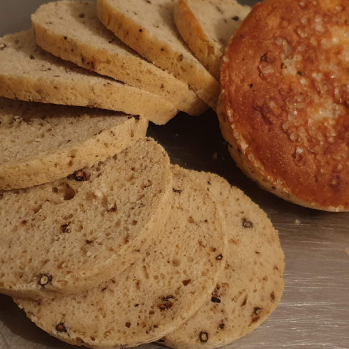 Clay pot bread sliced. hands-on workshop Llansteffan, West Wales